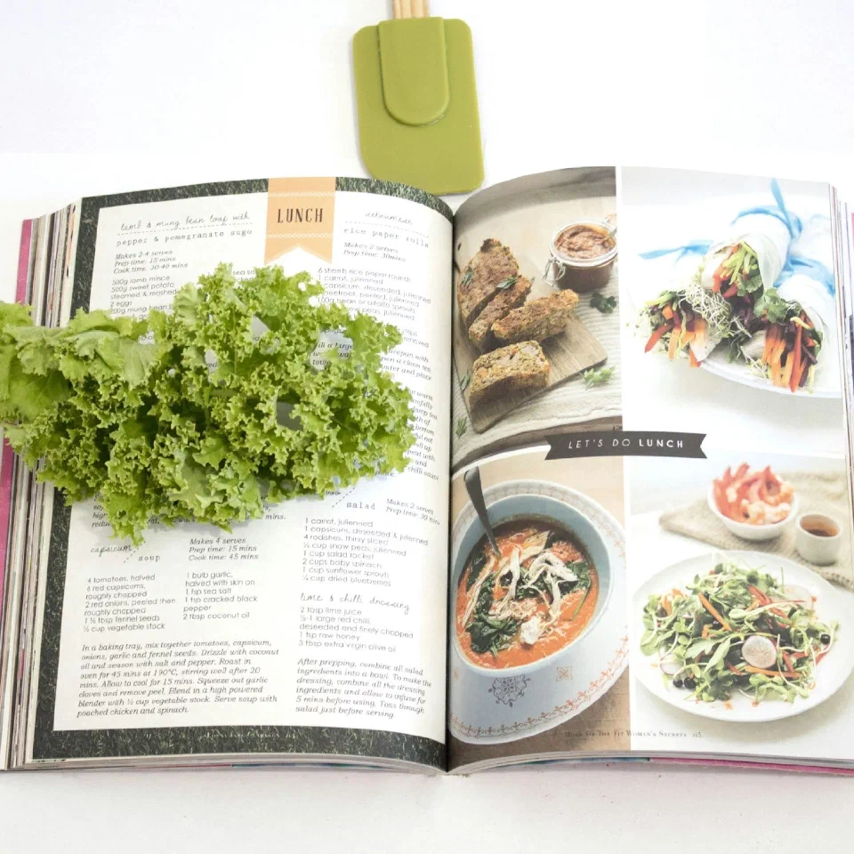 A cookbook open at a photographed recipe spread
