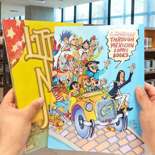Two large-format books held up in a library, one a history of Mexican comic books
